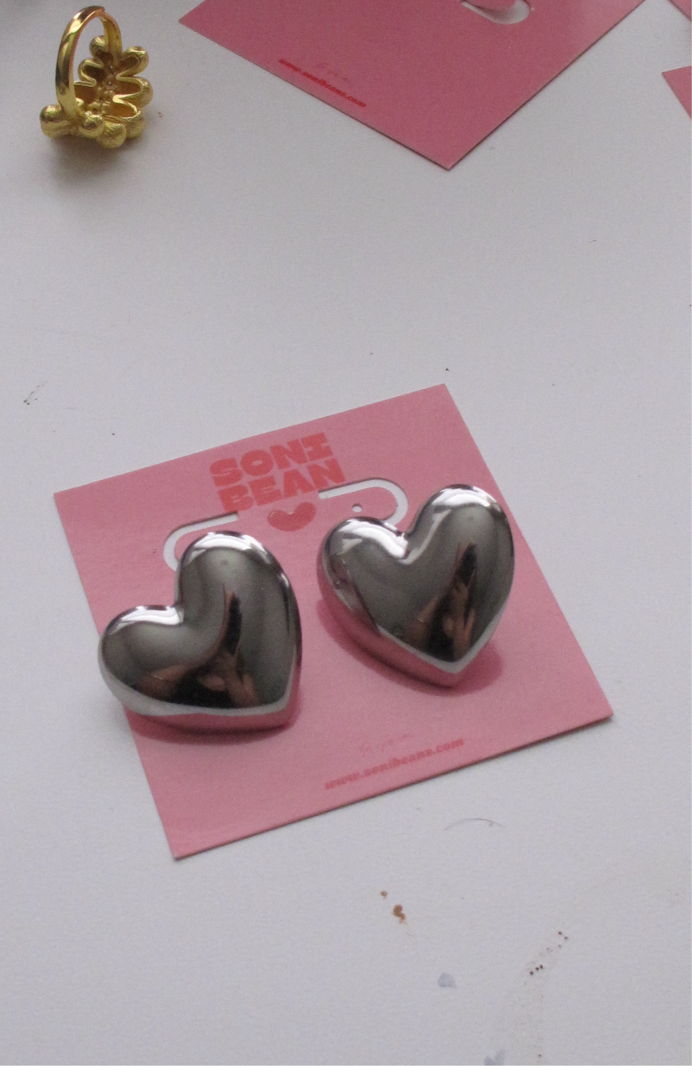 Silver heart studs