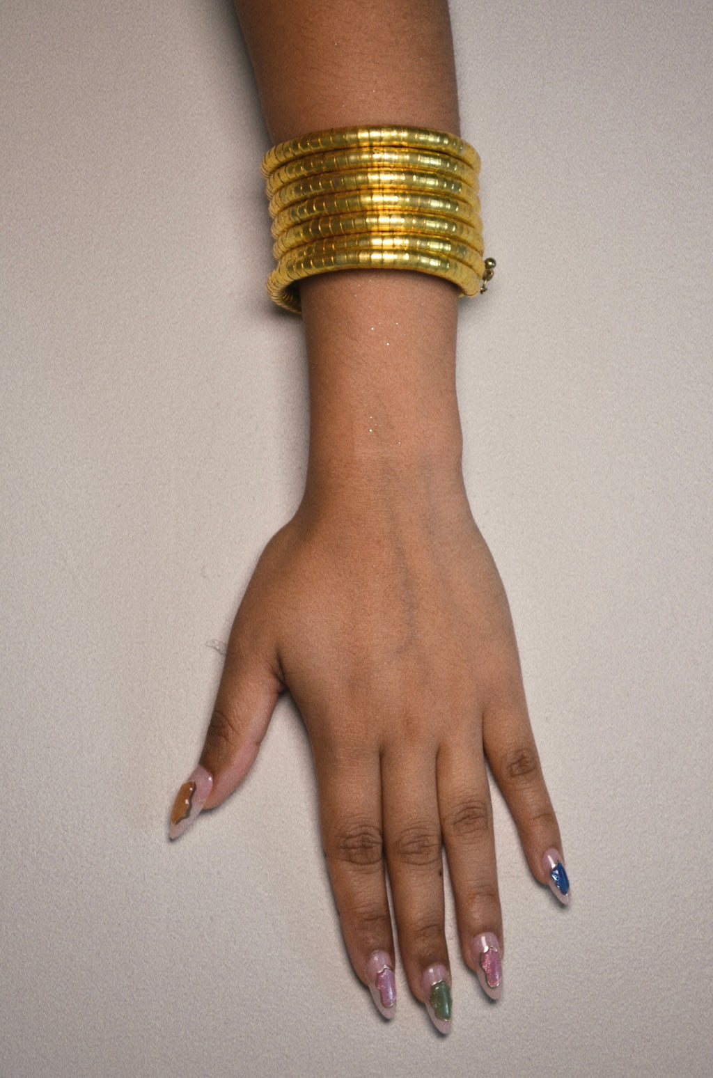 Gold swirl wrap around bracelet