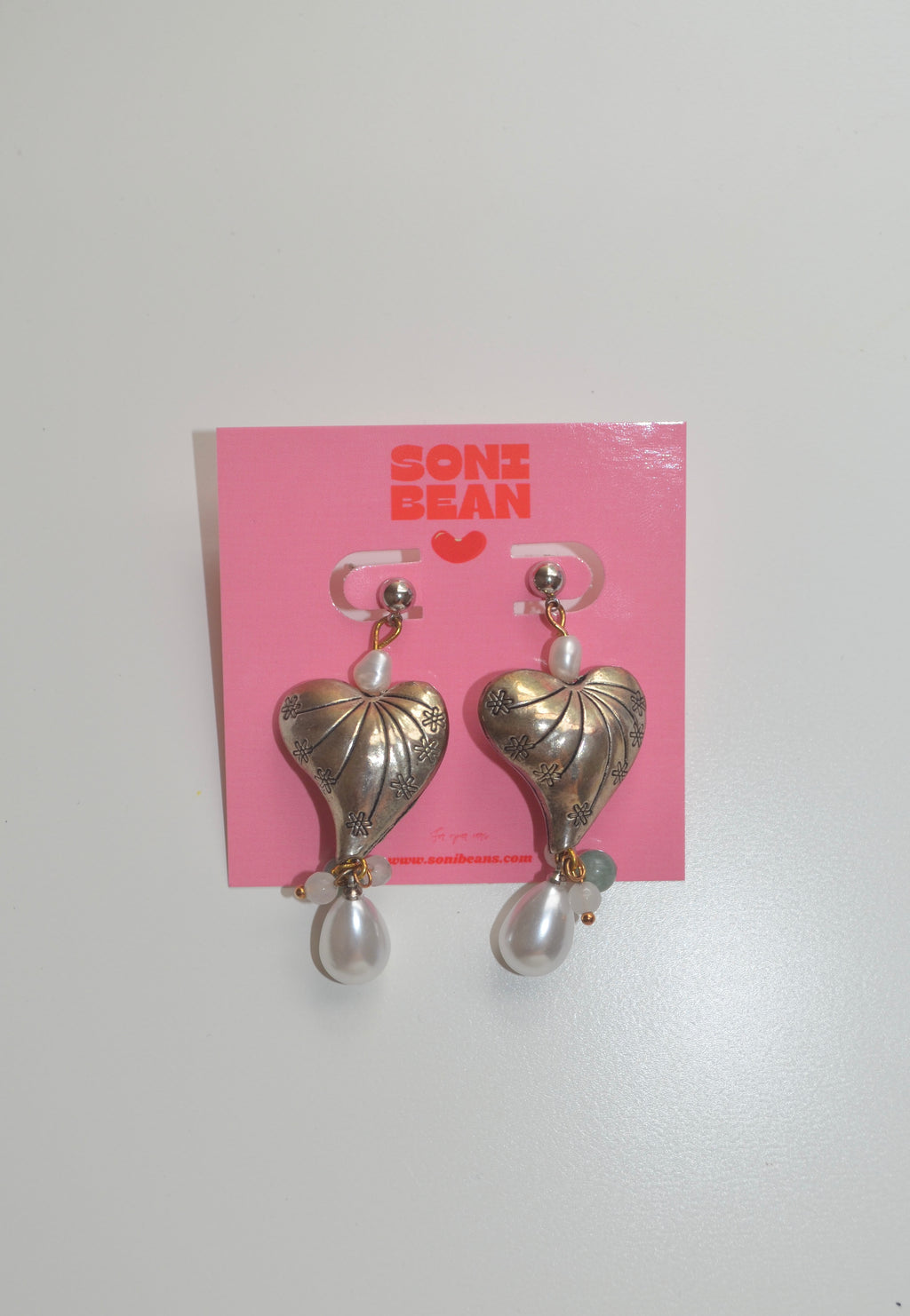 Silver heart jhumkas
