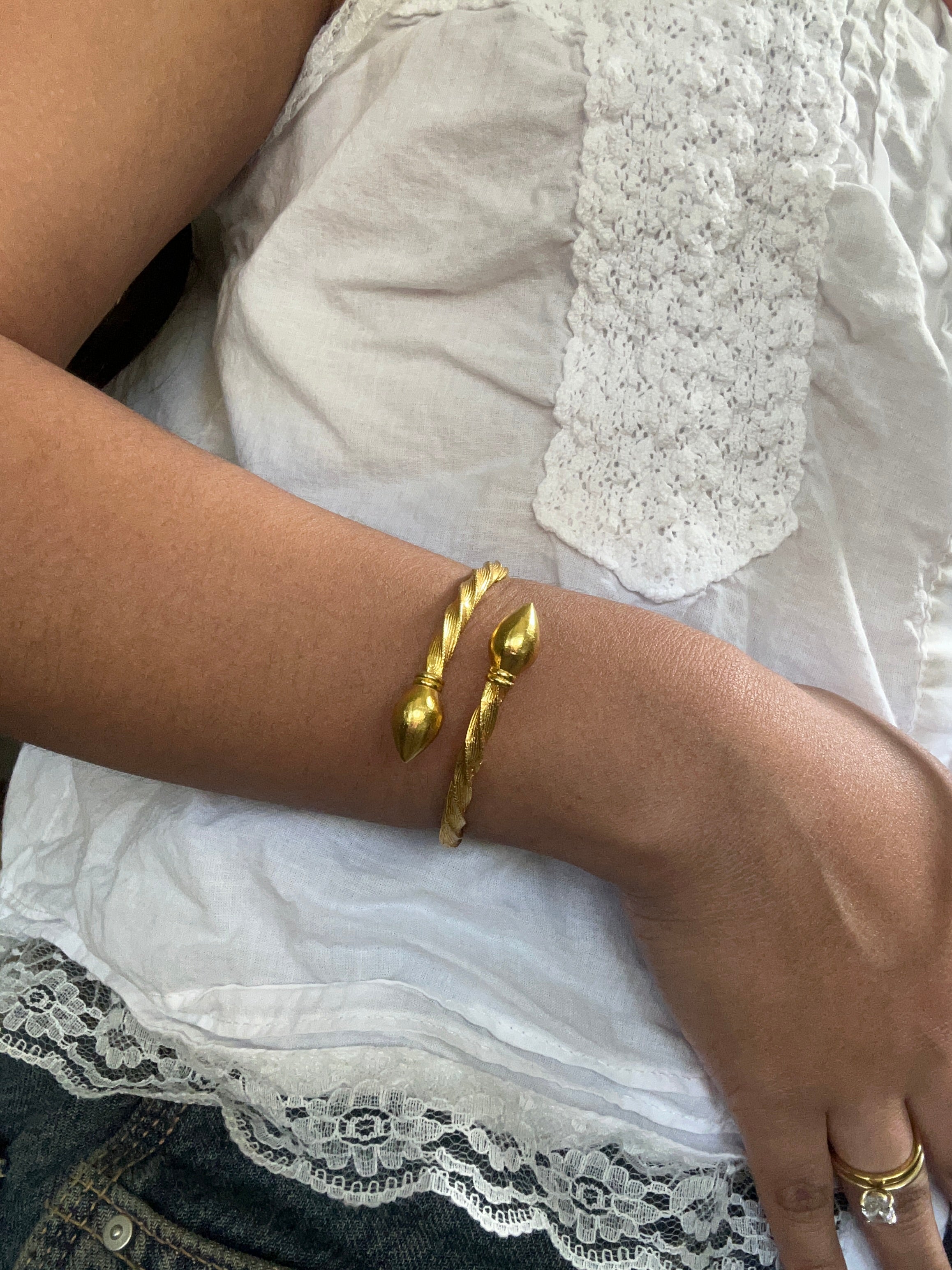 Adjustable twisted gold cuff
