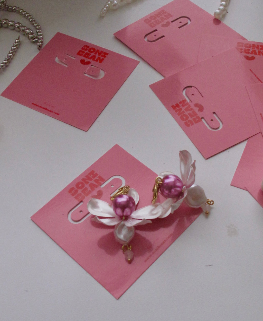 Pink flower drop earring