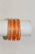 Orange creamsicle bangle stack