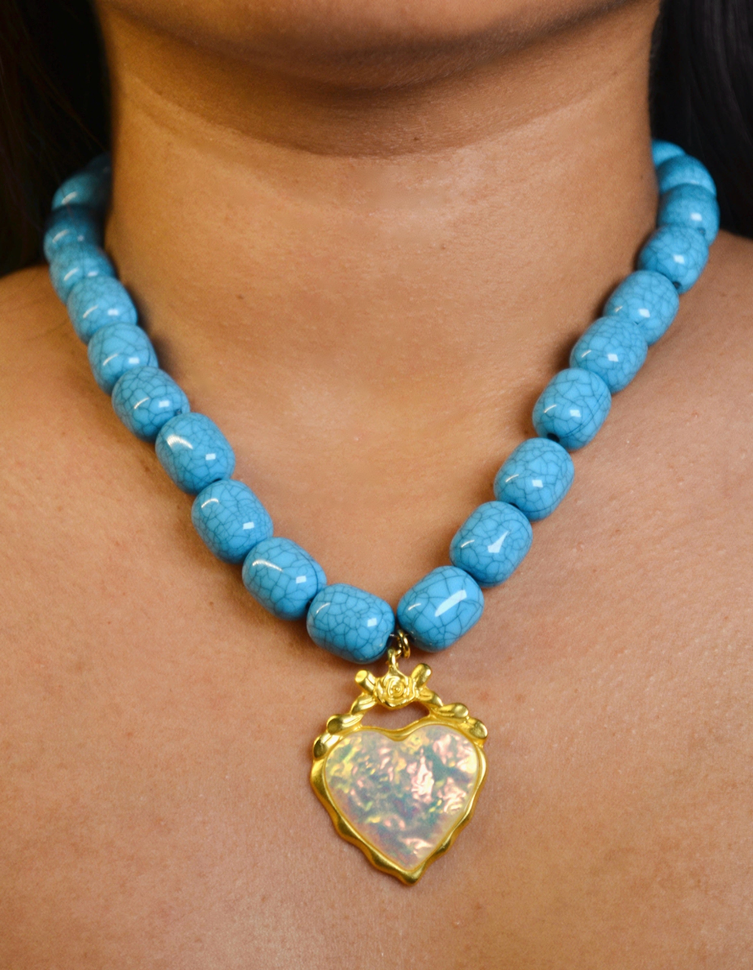 Turquoise beaded necklace with heart pendant